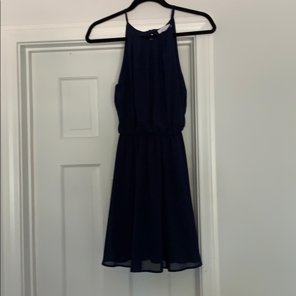 flowy navy dress with open back